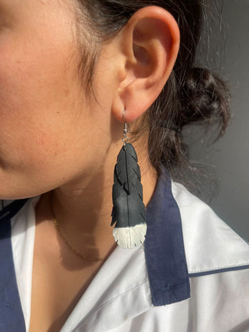 Huia feather earrings